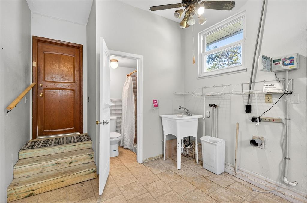 1520 South Keene Road Clearwater, FL 33756 - Photo 39 of 60 a bathroom with a bathtub and a shower