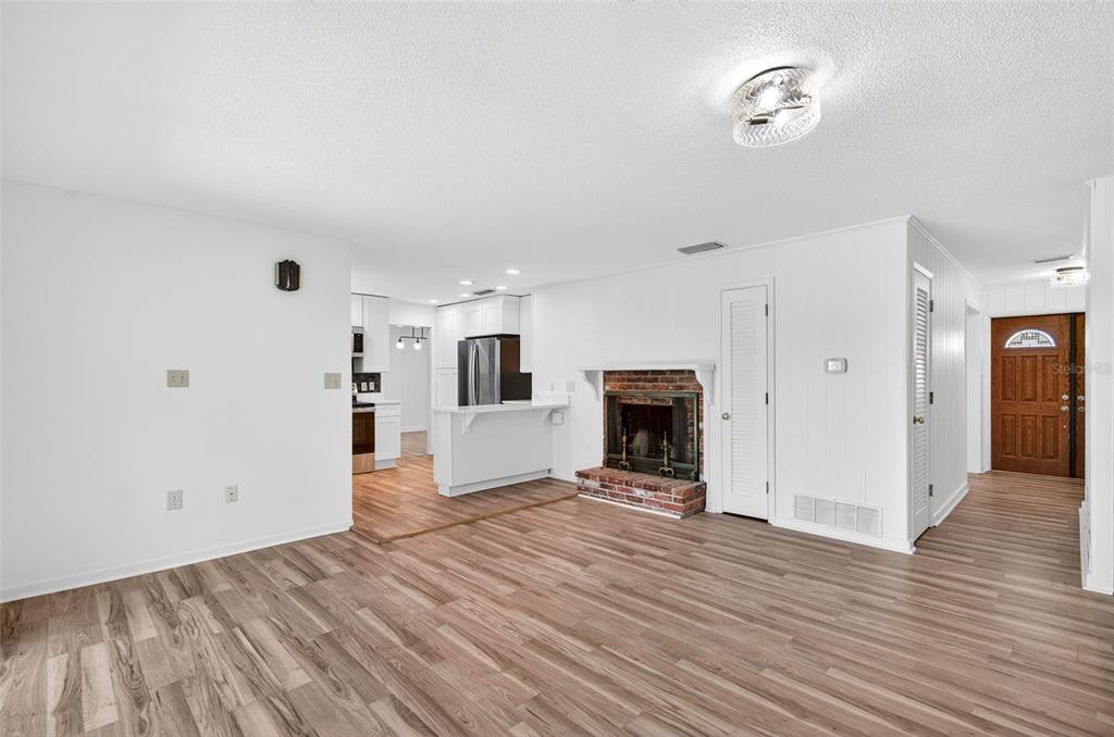 1520 South Keene Road Clearwater, FL 33756 - Photo 5 of 60 a view of a livingroom with wooden floor