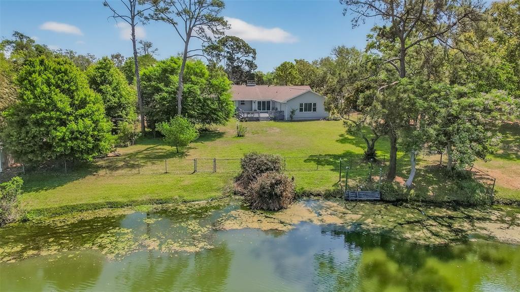 1520 South Keene Road Clearwater, FL 33756 - Photo 54 of 60 a view of a house with a yard