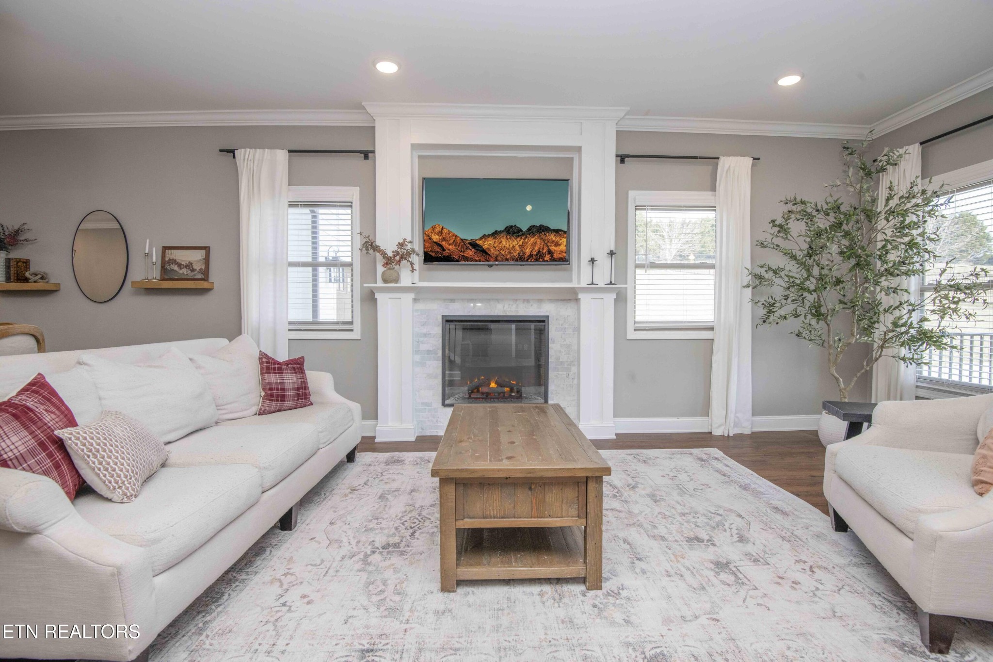 1562 Pullen Road Sevierville, TN 37862 - Photo 13 of 53 a living room with furniture and a fireplace