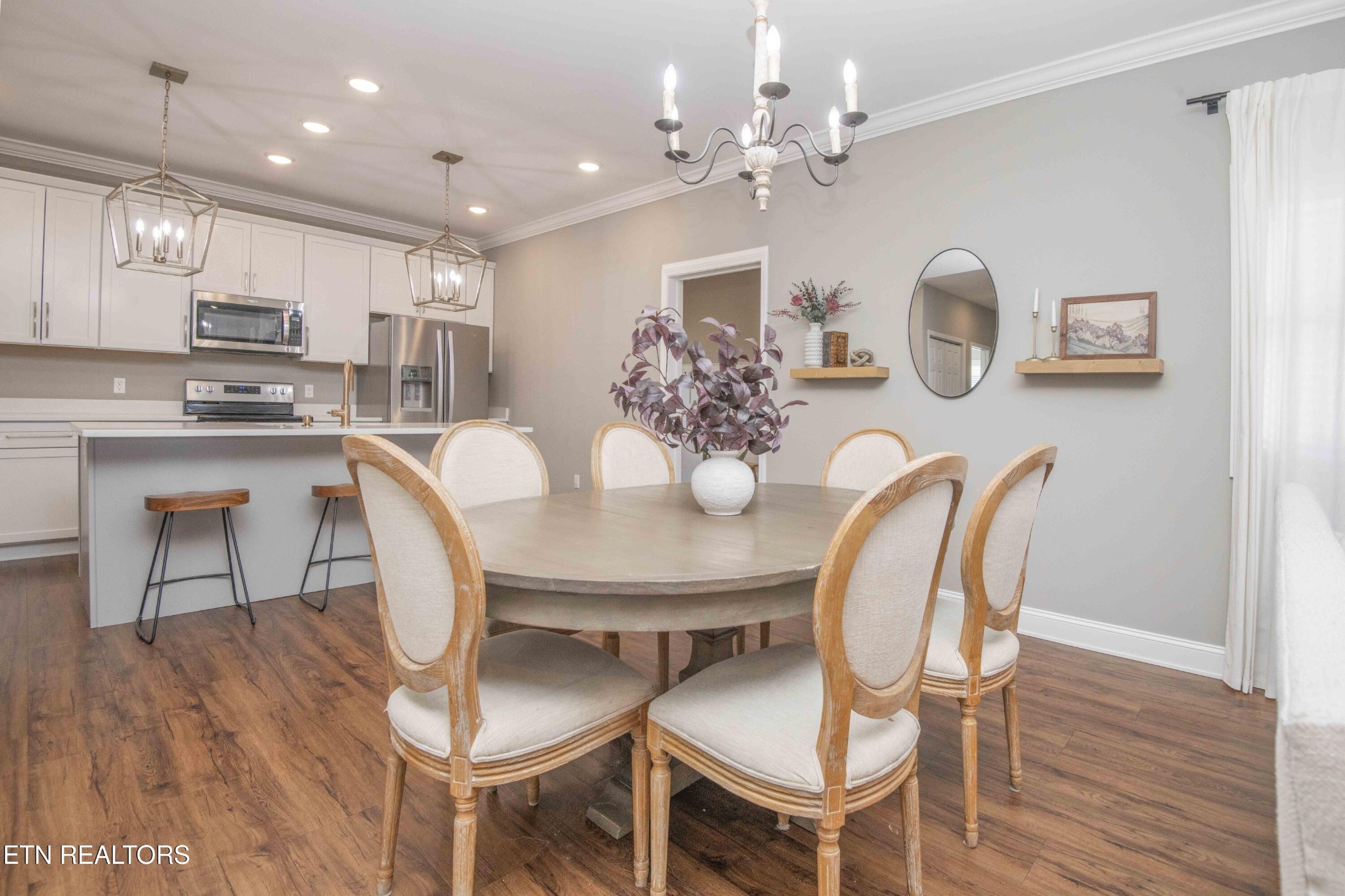 1562 Pullen Road Sevierville, TN 37862 - Photo 17 of 53 a view of a dining room with furniture and wooden floor