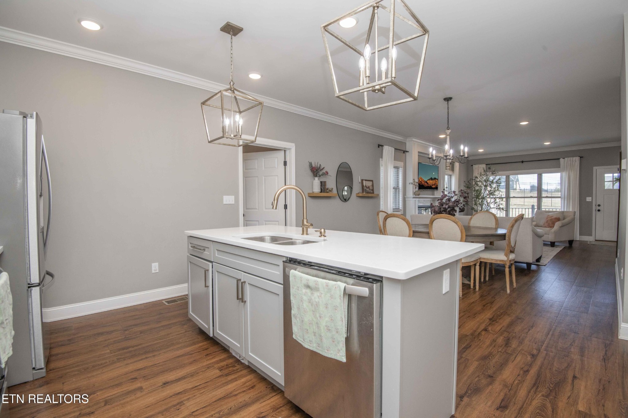 1562 Pullen Road Sevierville, TN 37862 - Photo 20 of 53 a kitchen with stainless steel appliances granite countertop a kitchen island a stove a table and chairs