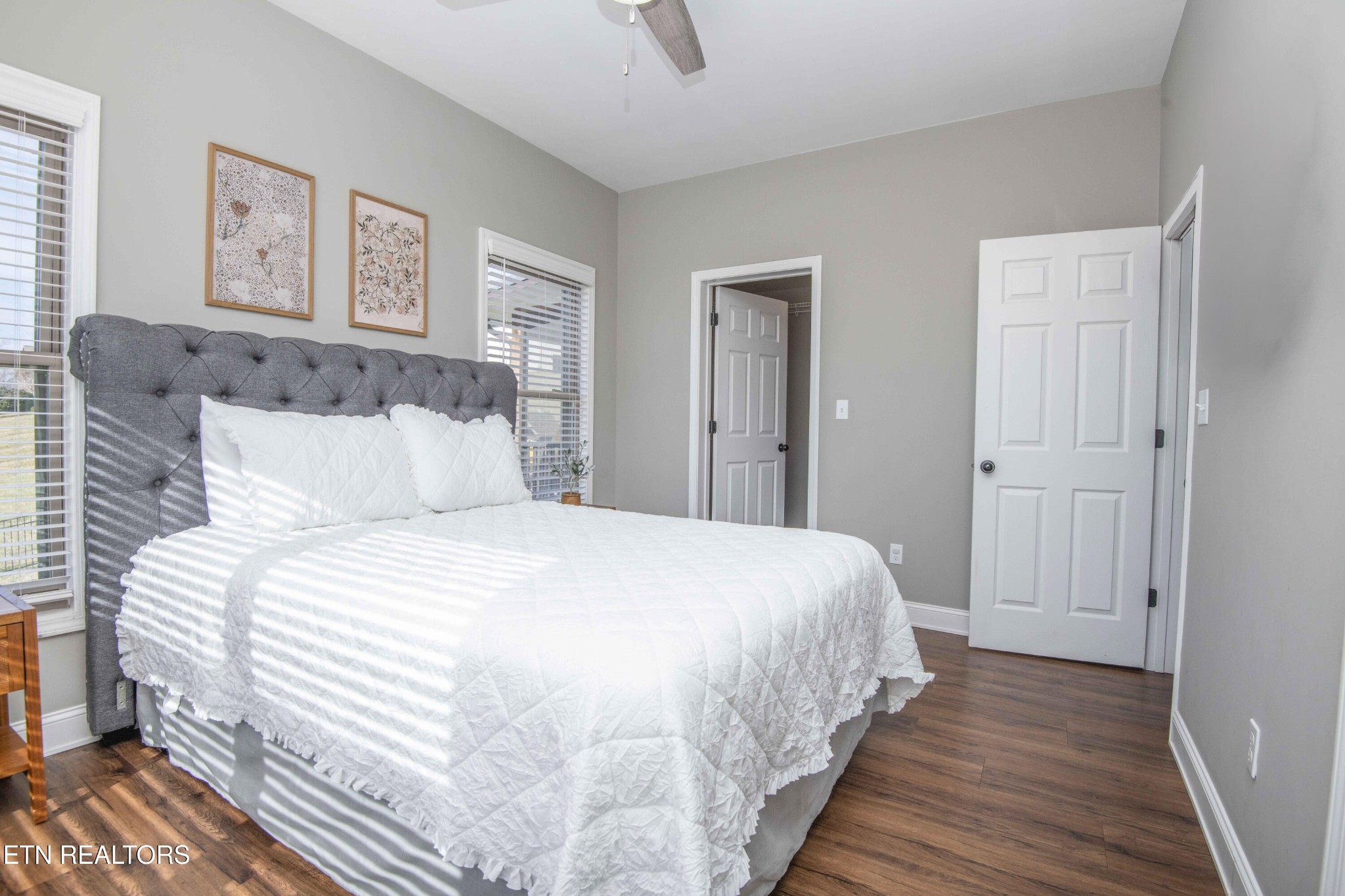 1562 Pullen Road Sevierville, TN 37862 - Photo 30 of 53 a bedroom with bed and paintings on the wall