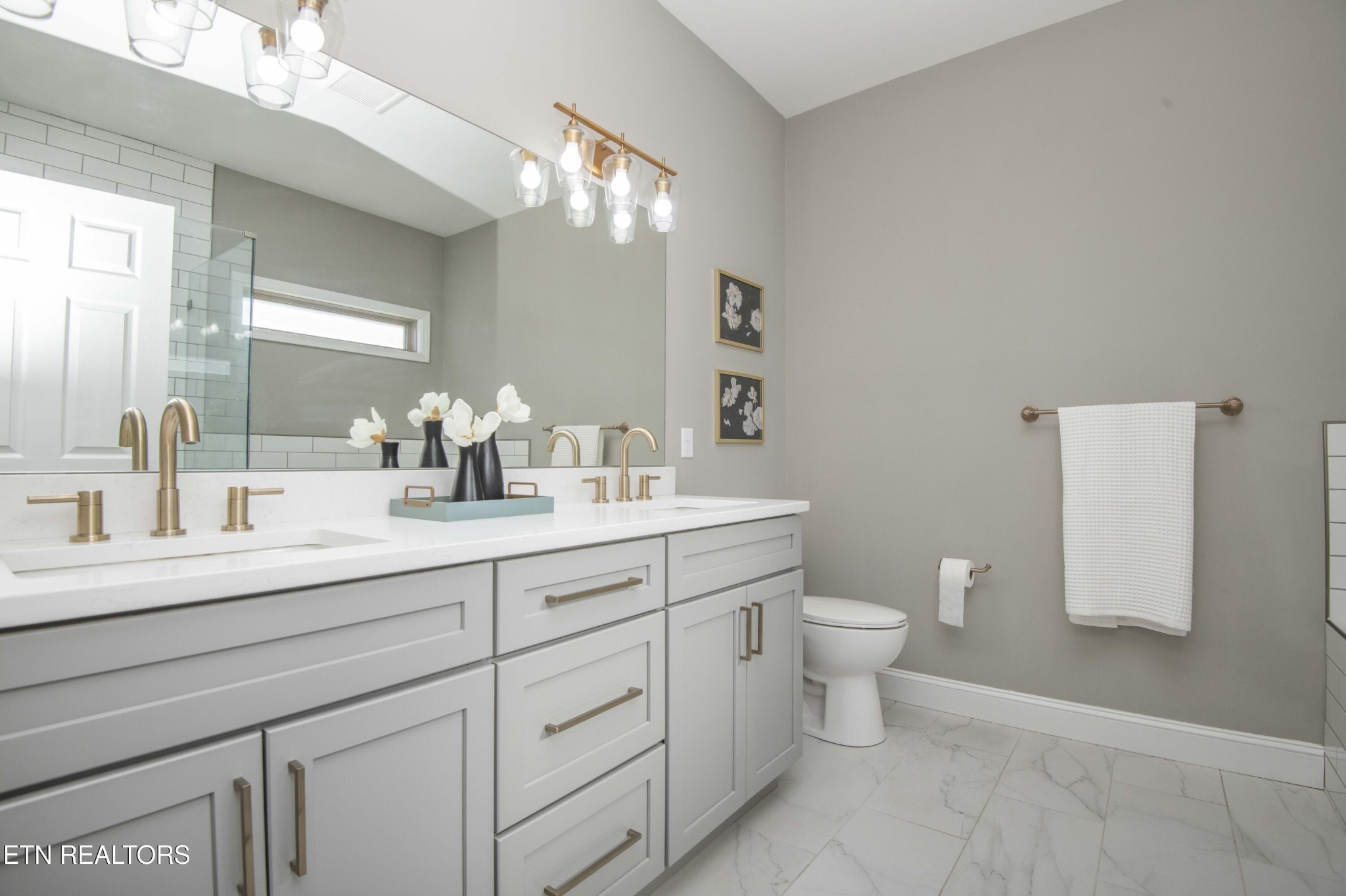 1562 Pullen Road Sevierville, TN 37862 - Photo 32 of 53 a bathroom with a double vanity sink mirror and toilet