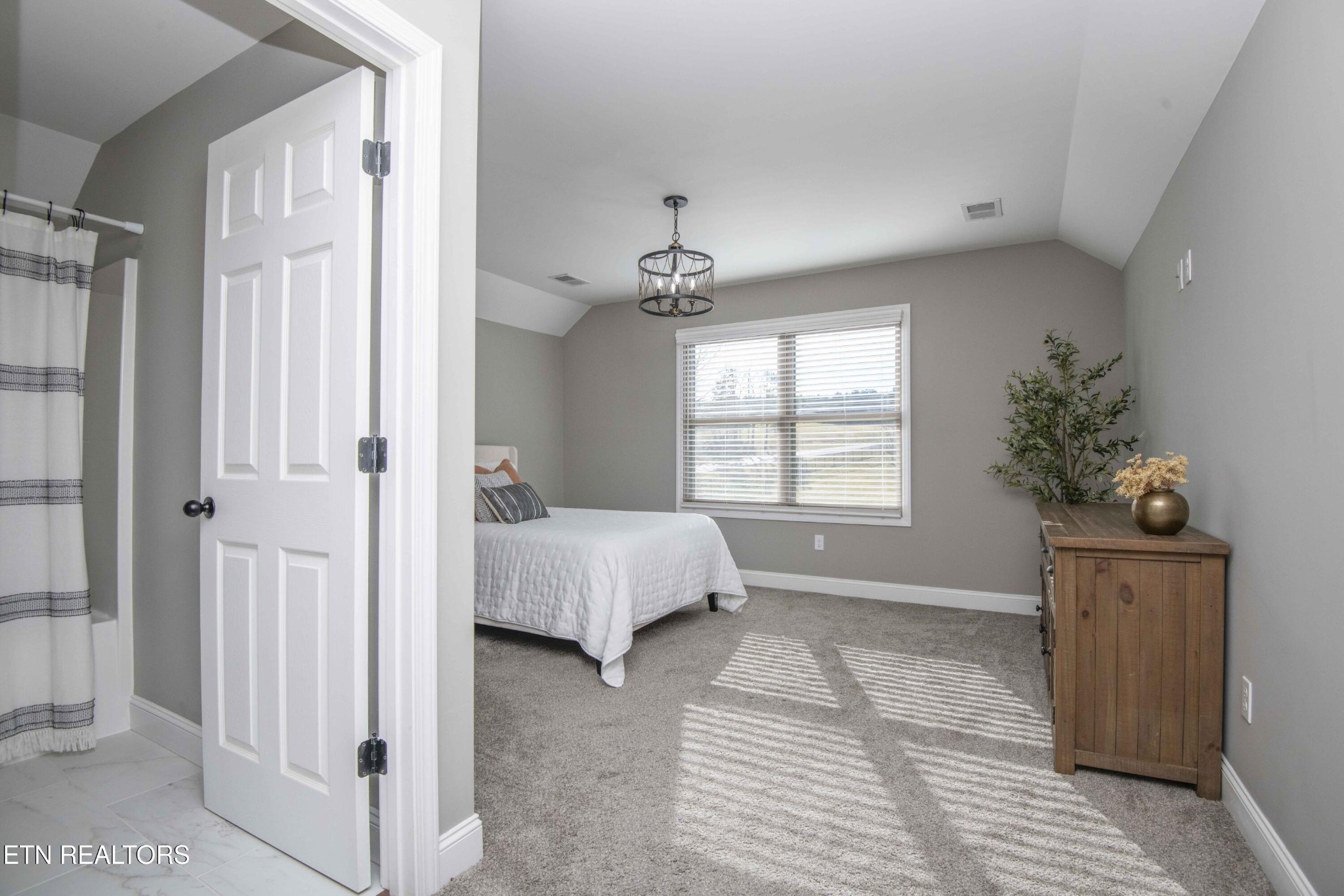 1562 Pullen Road Sevierville, TN 37862 - Photo 43 of 53 a spacious bedroom with a bed and a window