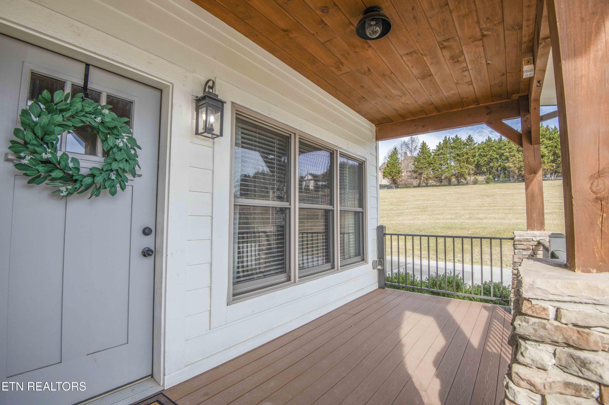1562 Pullen Road Sevierville, TN 37862 - Photo 7 of 53 a view of a porch with wooden floor and fence
