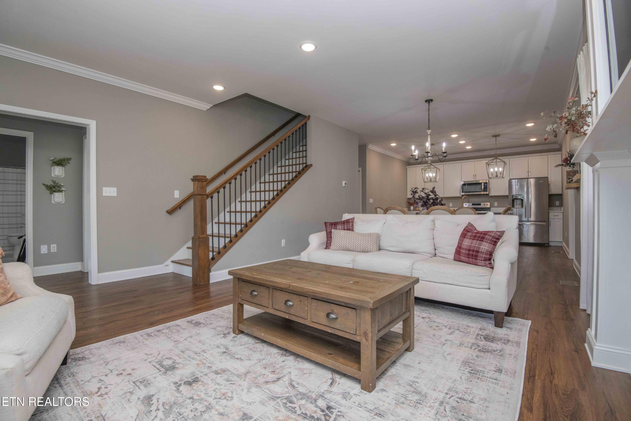 1562 Pullen Road Sevierville, TN 37862 - Photo 10 of 53 a living room with furniture and a dining table with kitchen view