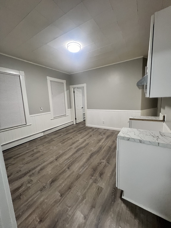 136-142 Bailey Street, Unit 2 Lawrence, MA 01843 - Photo 6 of 13 a view of empty room with wooden floor