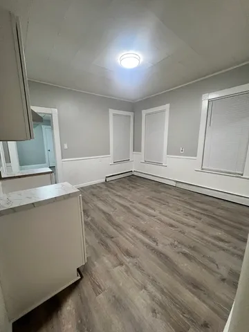 a view of a kitchen with a sink and a dishwasher