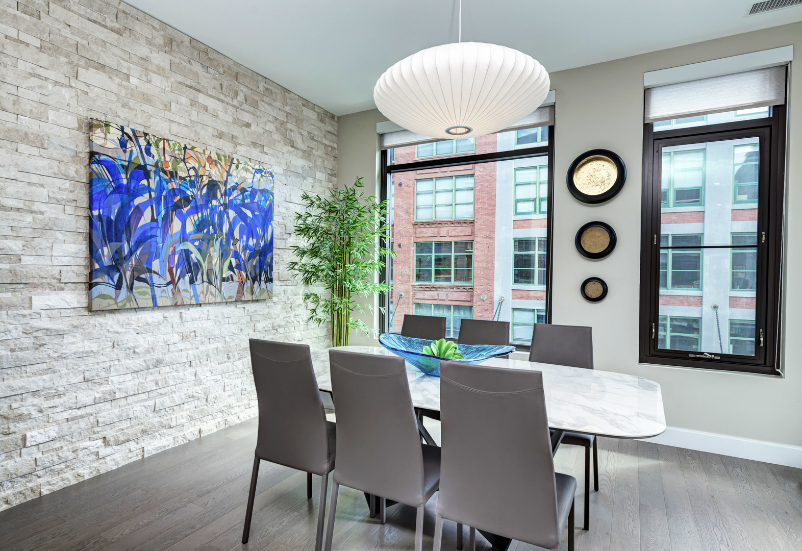 28 North Carpenter Street, Unit 3S Chicago, IL 60607 - Photo 12 of 37 a view of a dining room with furniture and wooden floor