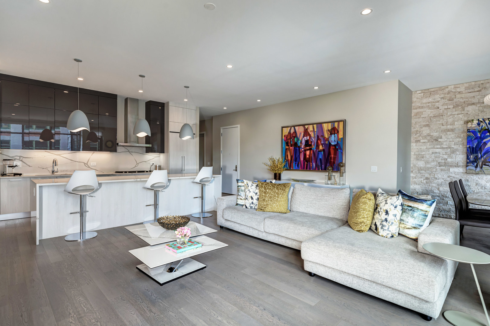 28 North Carpenter Street, Unit 3S Chicago, IL 60607 - Photo 15 of 37 a living room with furniture and kitchen view