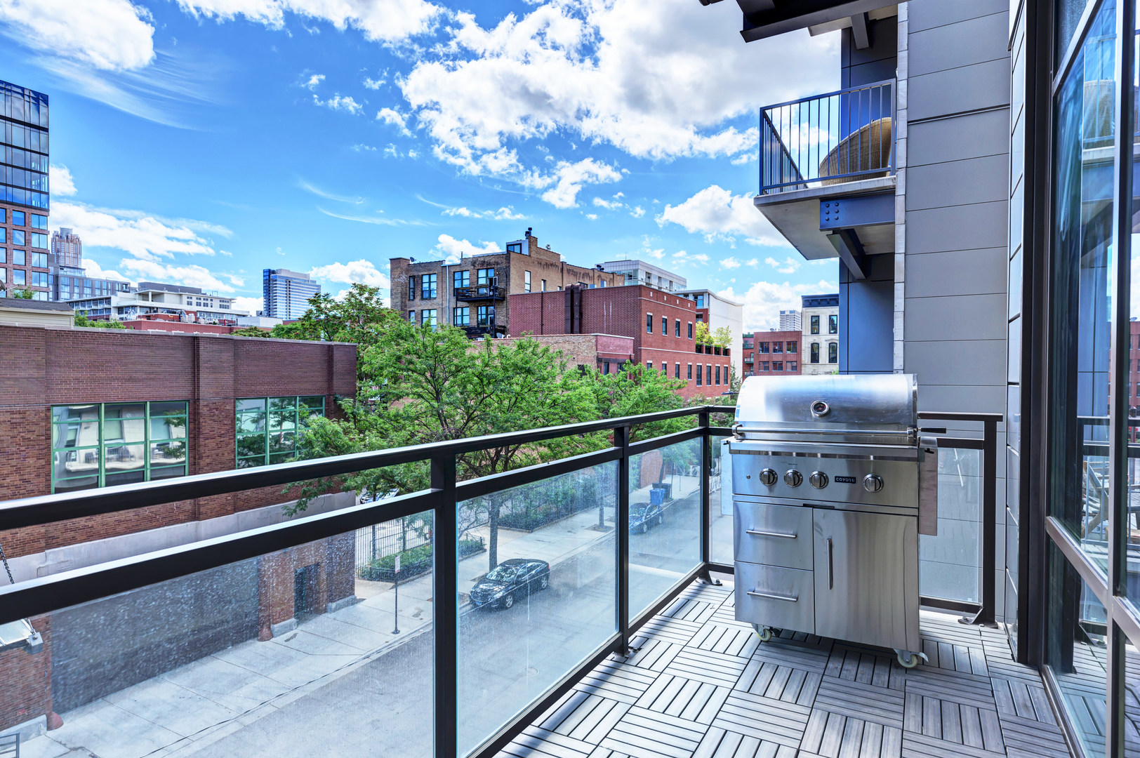 28 North Carpenter Street, Unit 3S Chicago, IL 60607 - Photo 17 of 37 a view of a balcony with an outdoor seating