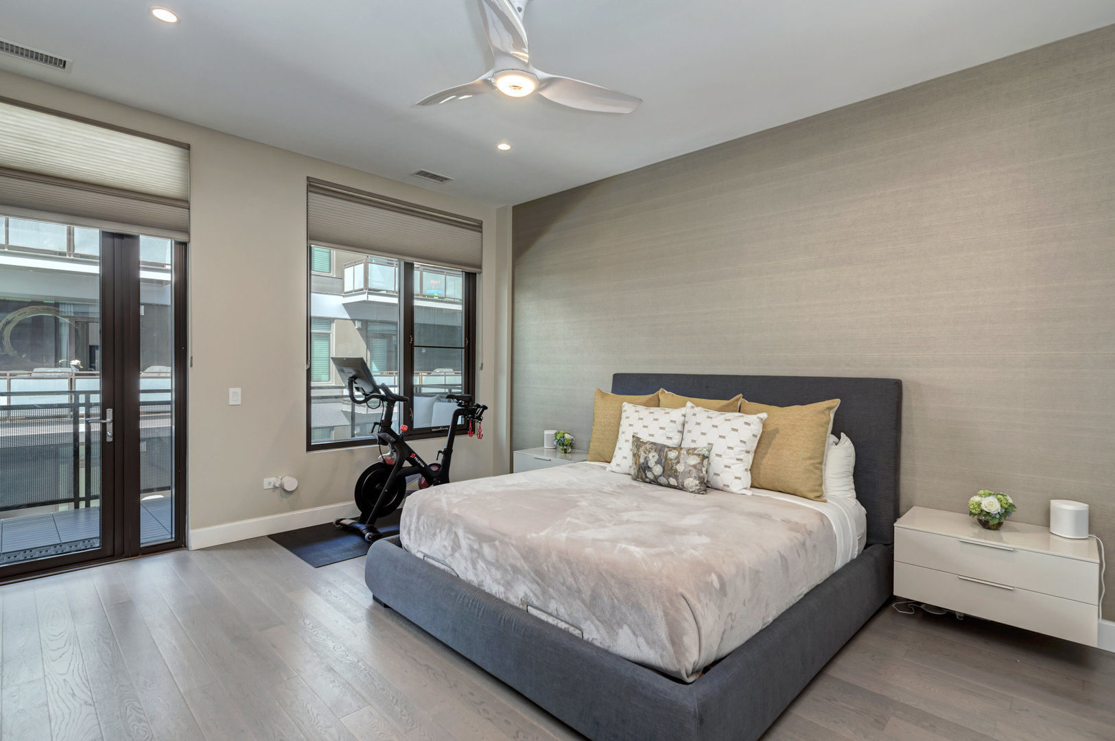 28 North Carpenter Street, Unit 3S Chicago, IL 60607 - Photo 19 of 37 a bedroom with a bed and a chandelier