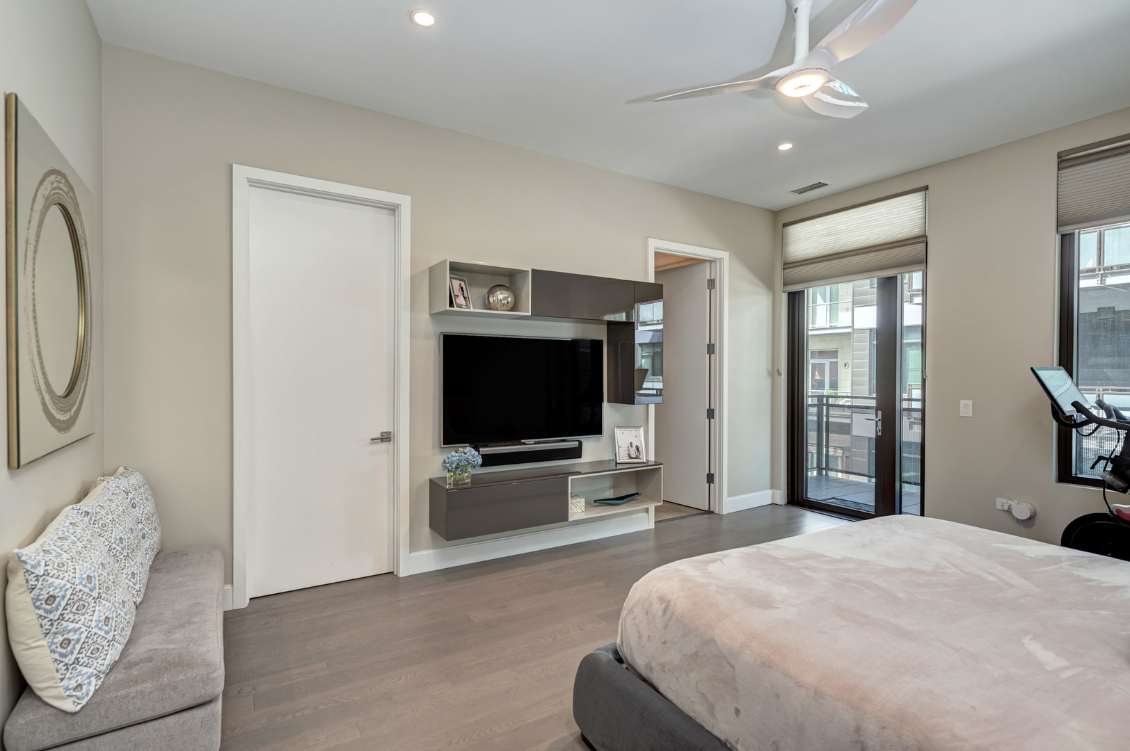 28 North Carpenter Street, Unit 3S Chicago, IL 60607 - Photo 20 of 37 a bedroom with furniture and a flat screen tv