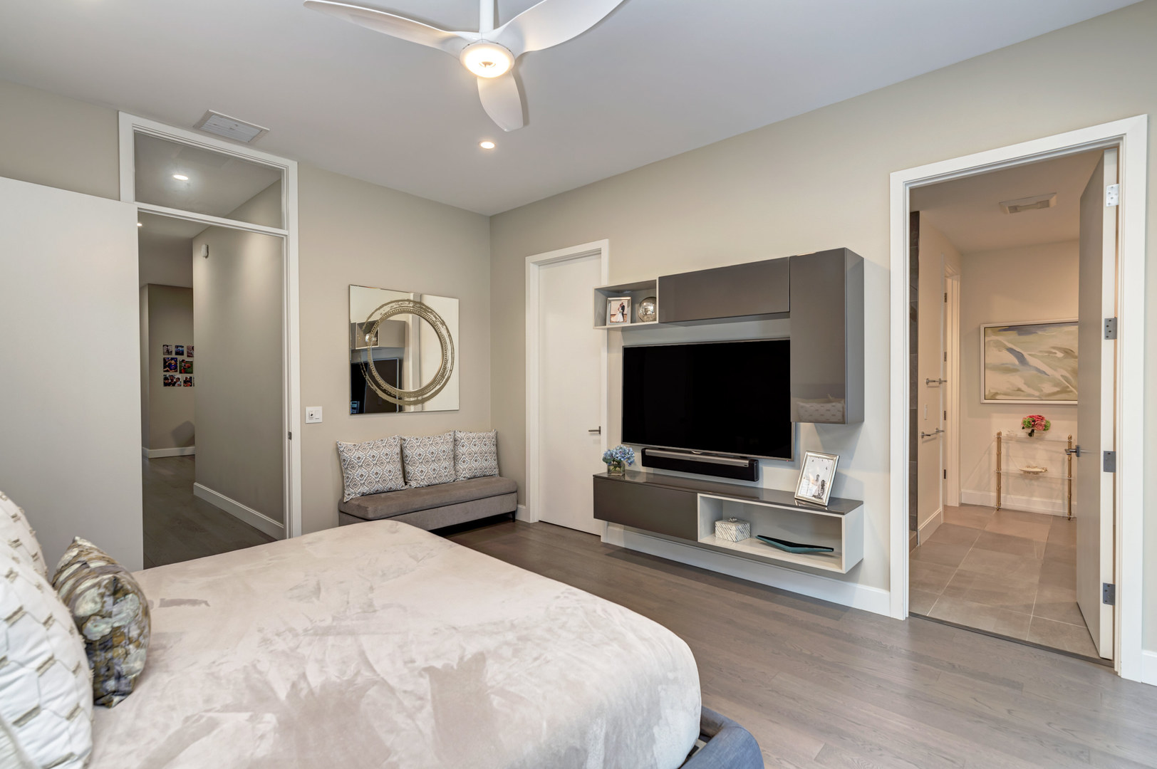 28 North Carpenter Street, Unit 3S Chicago, IL 60607 - Photo 21 of 37 a bedroom with a bed and a flat screen tv