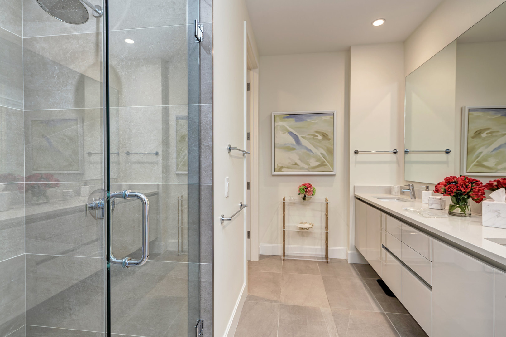 28 North Carpenter Street, Unit 3S Chicago, IL 60607 - Photo 22 of 37 a bathroom with a double vanity sink a mirror and a shower