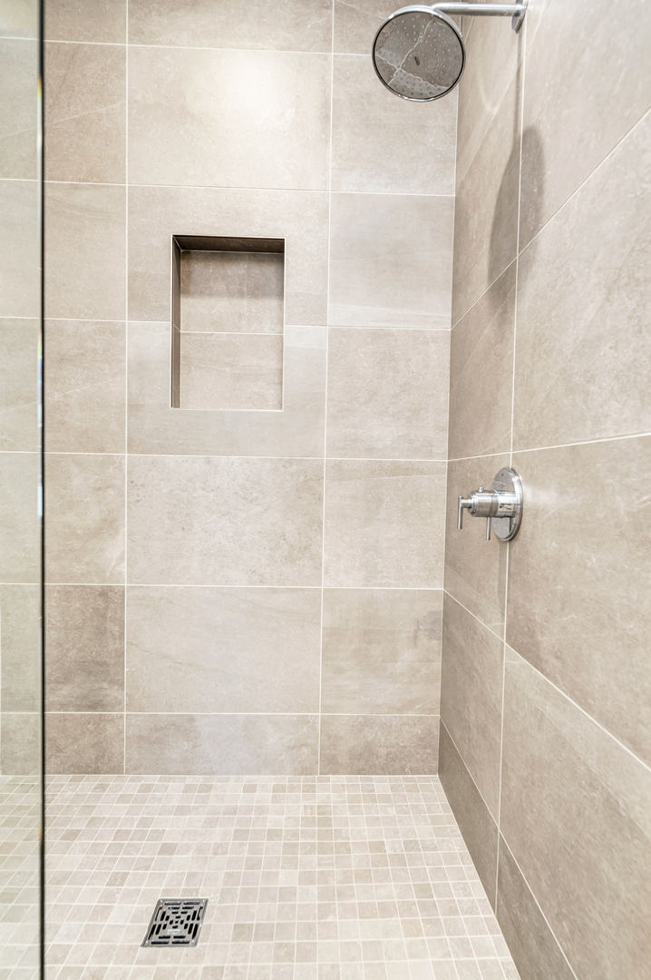 28 North Carpenter Street, Unit 3S Chicago, IL 60607 - Photo 24 of 37 a bathroom with a shower