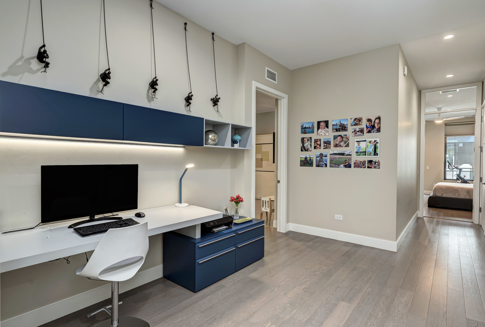 28 North Carpenter Street, Unit 3S Chicago, IL 60607 - Photo 28 of 37 a room with furniture and a flat screen tv