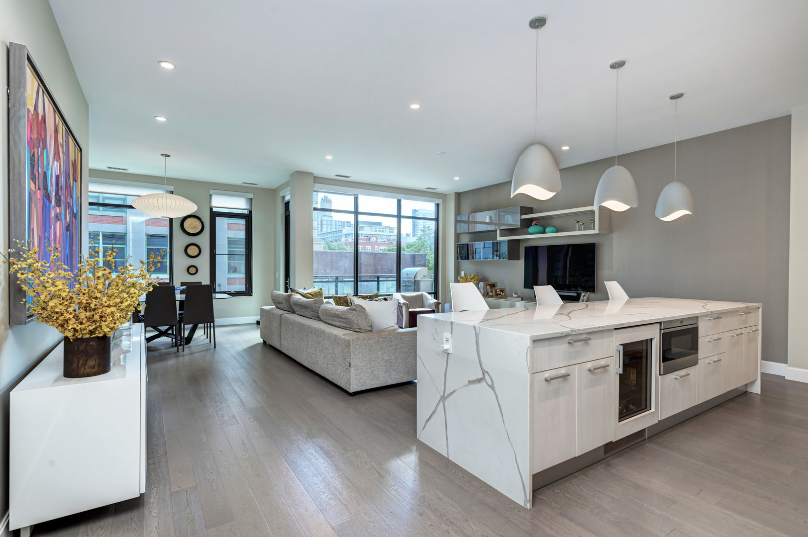 28 North Carpenter Street, Unit 3S Chicago, IL 60607 - Photo 3 of 37 a view of living room with furniture and wooden floor