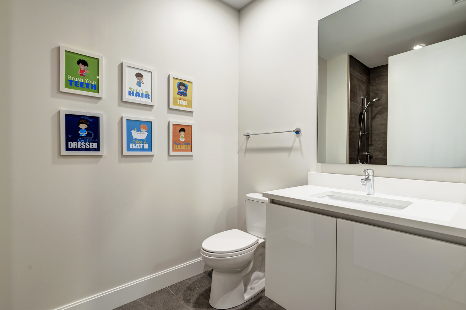 28 North Carpenter Street, Unit 3S Chicago, IL 60607 - Photo 32 of 37 a bathroom with a toilet sink and mirror