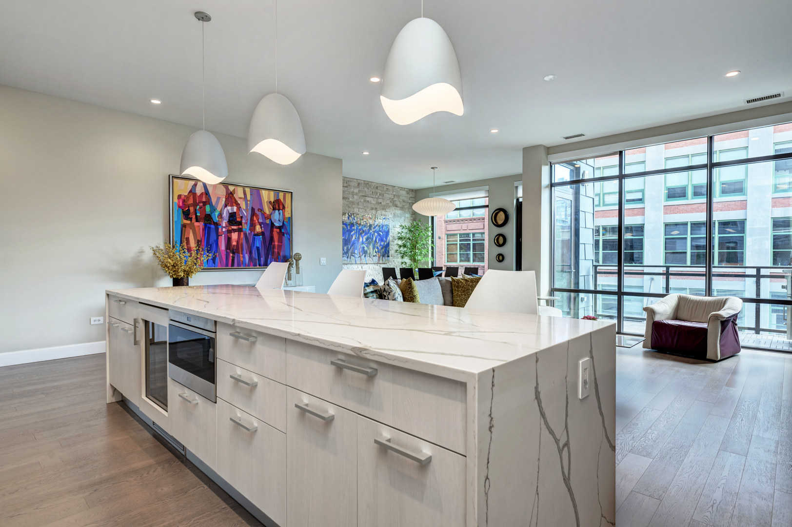 28 North Carpenter Street, Unit 3S Chicago, IL 60607 - Photo 8 of 37 a large white kitchen with a large window
