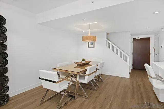 a view of a livingroom with furniture and a table