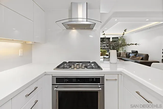 a bedroom with a bed and cabinet