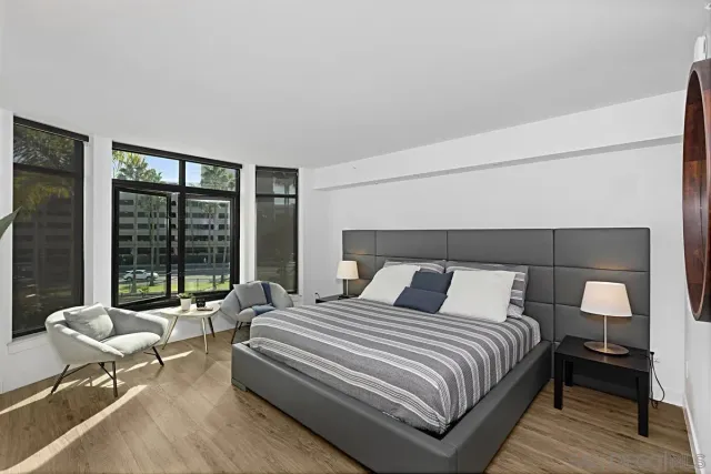 a bedroom with a bed and a closet