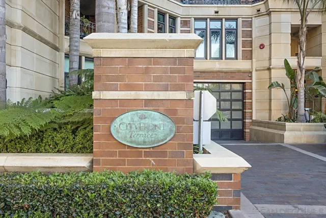 a lobby with furniture and window