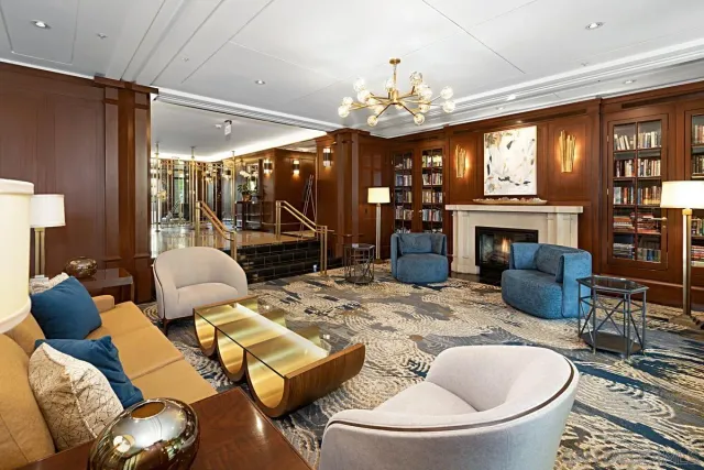 a view of a patio with a table and chairs