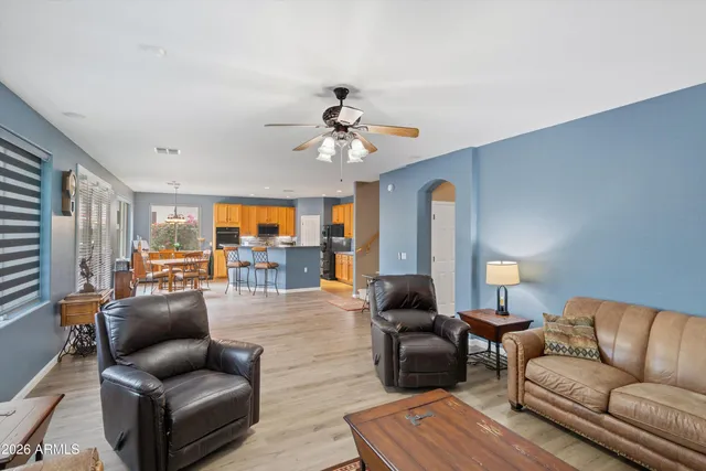 a white toilet sitting next to a shower curtain