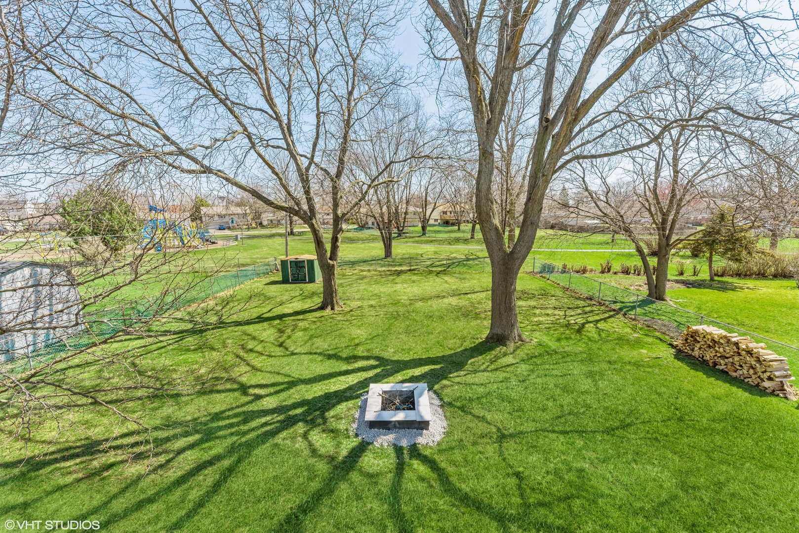 501 Ridge Circle Streamwood, IL 60107 - Photo 14 of 15 a backyard of a house with lots of green space