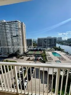 a view of a balcony with chairs
