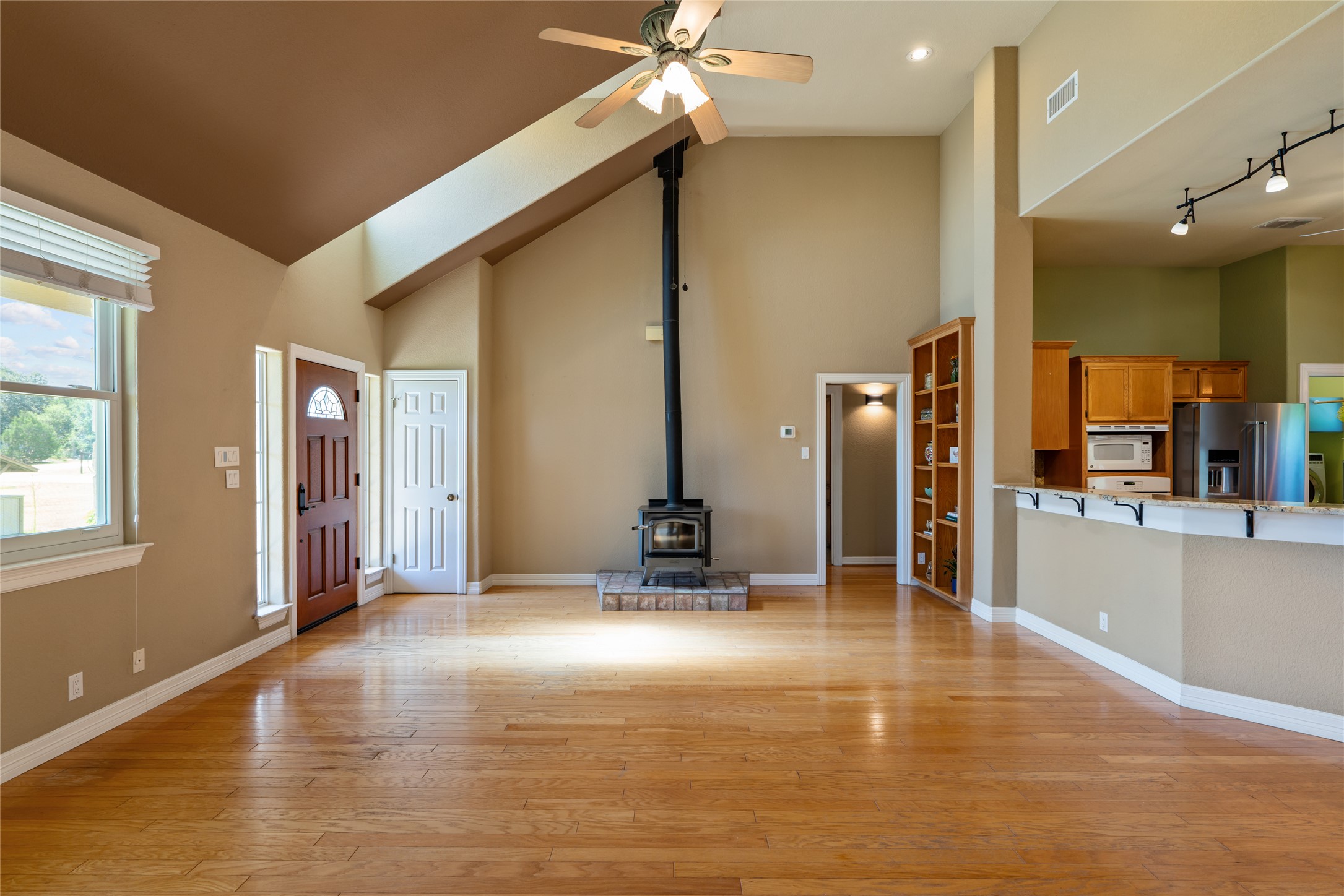 221 Chaparral Road Georgetown, TX 78628 - Photo 4 of 28 Wood burning stove in family room