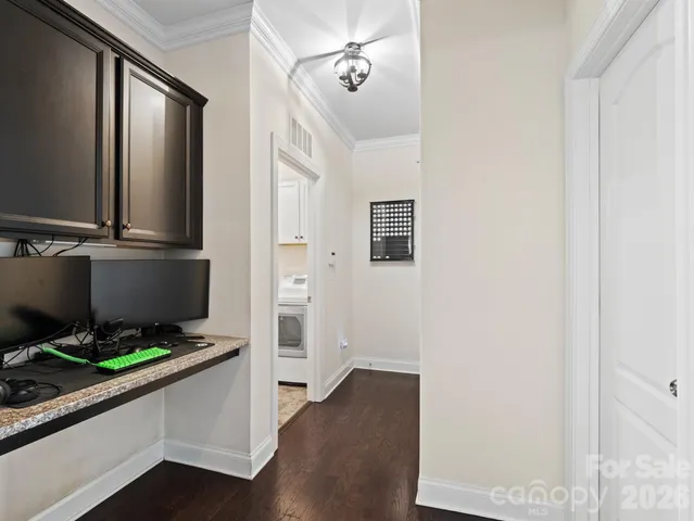 a view of a hallway with workspace