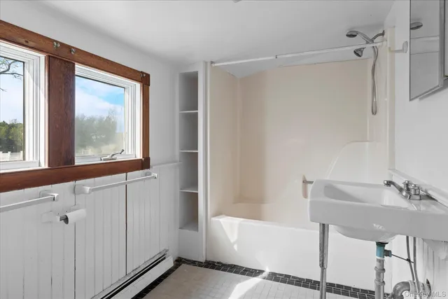 a view of an entryway with hardwood