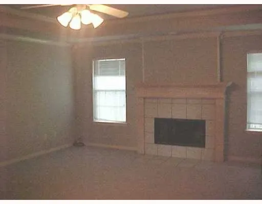 a view of a livingroom with a fireplace