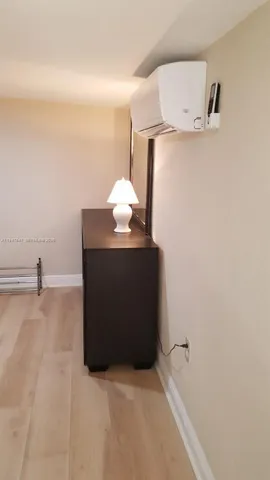 a view of a room with an empty space