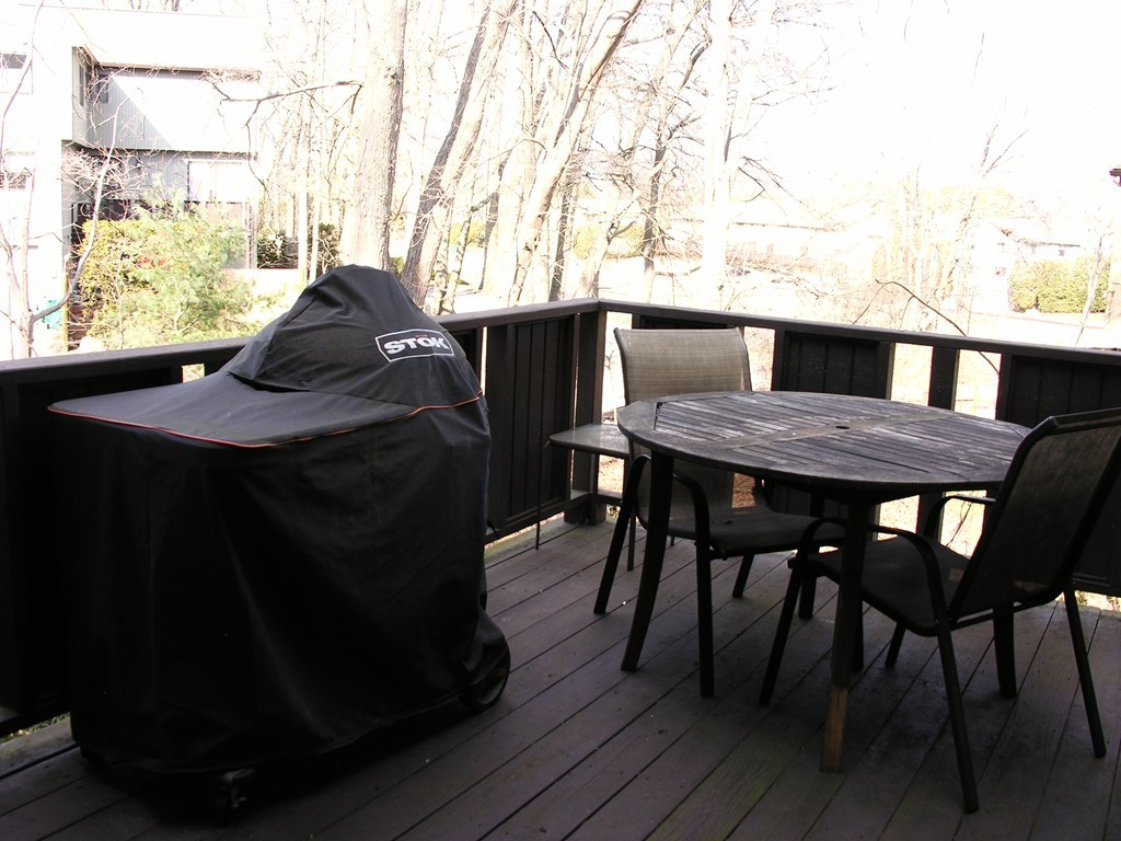 78 Mountain Gate Road, Unit 78 Ashland, MA 01721 - Photo 15 of 17 a dining room with furniture and wooden floor