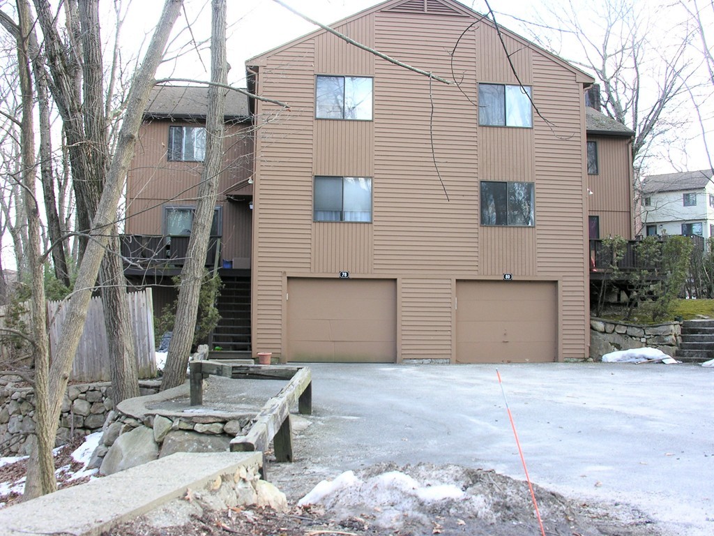 78 Mountain Gate Road, Unit 78 Ashland, MA 01721 - Photo 2 of 17 a view of a house with backyard