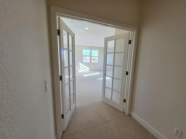 a view of a porch with furniture
