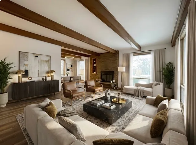 a living room with furniture fireplace and a large window