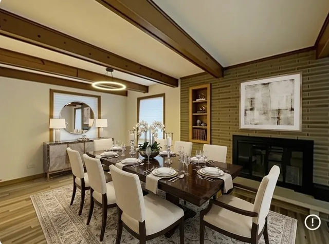 a dining room with furniture window and wooden floor