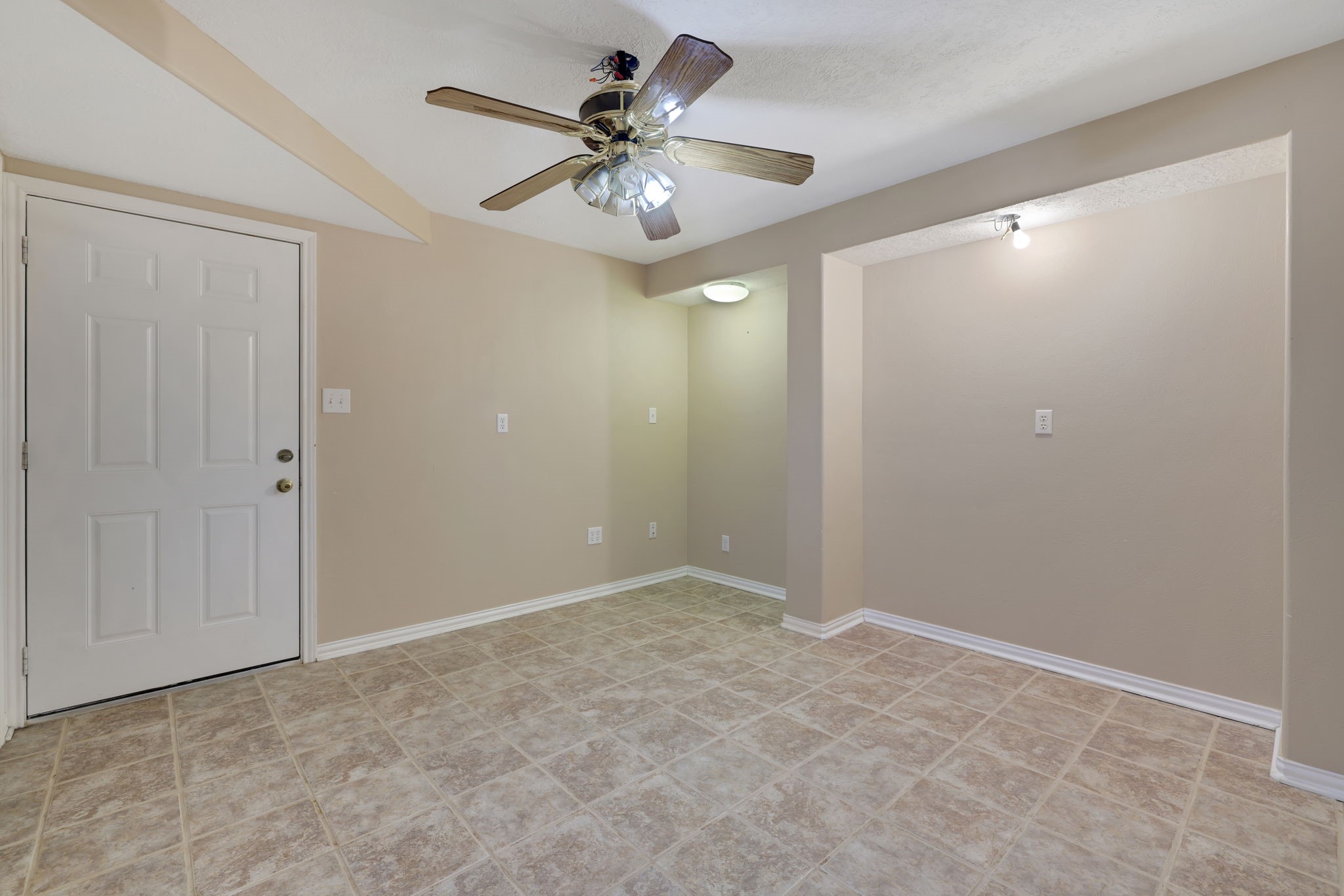 360 Holiday Lane Coldspring, TX 77331 - Photo 34 of 40 This additional bedroom leads through to the one car garage