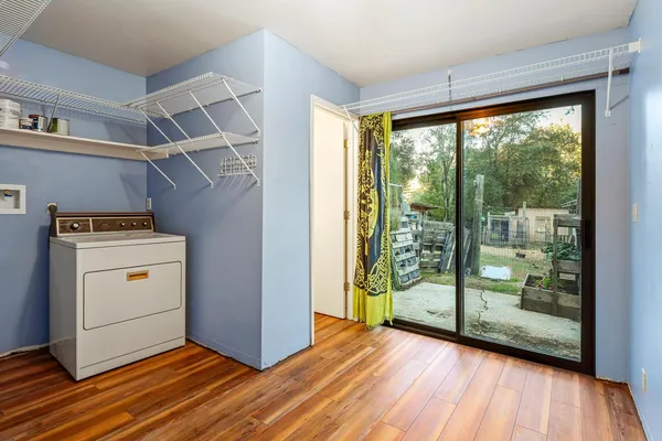 a view of a room with washer and dryer
