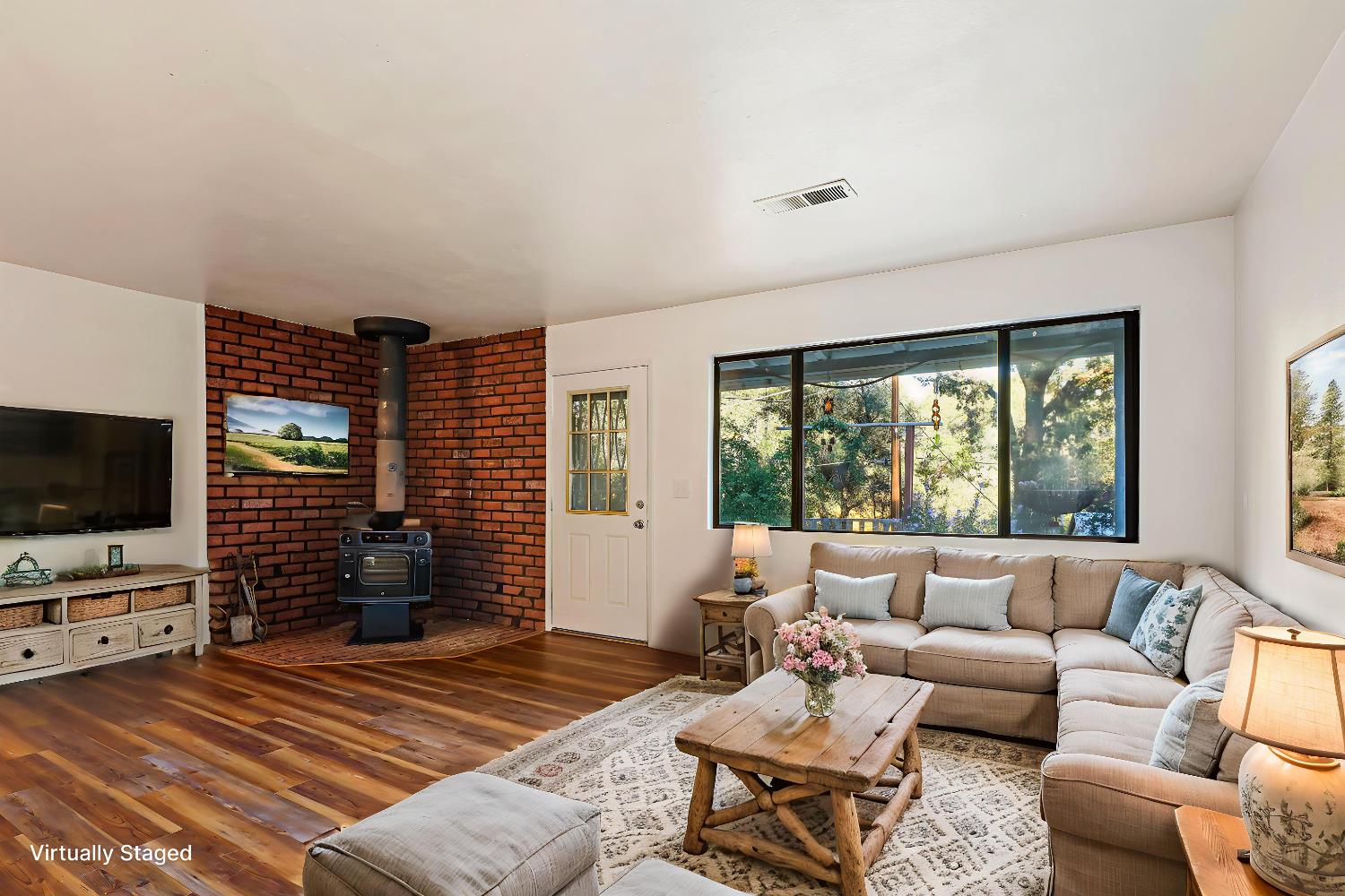9174 State Rte 26 Mokelumne Hill, CA 95245 - Photo 2 of 52 a living room with furniture and a flat screen tv