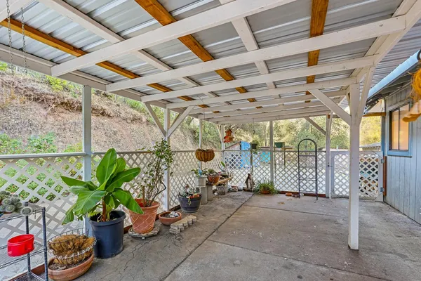a view of a porch with furniture
