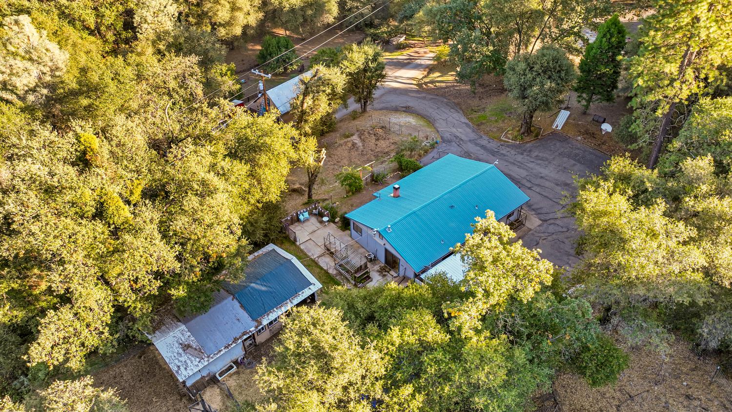 9174 State Rte 26 Mokelumne Hill, CA 95245 - Photo 45 of 52 an aerial view of a house with a yard basket ball court and outdoor seating