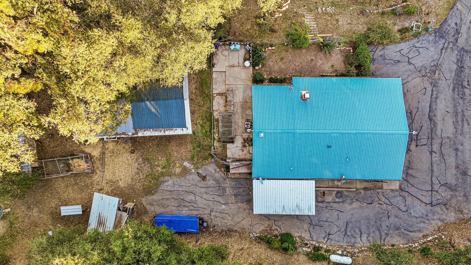 9174 State Rte 26 Mokelumne Hill, CA 95245 - Photo 46 of 52 an aerial view of a house with a yard