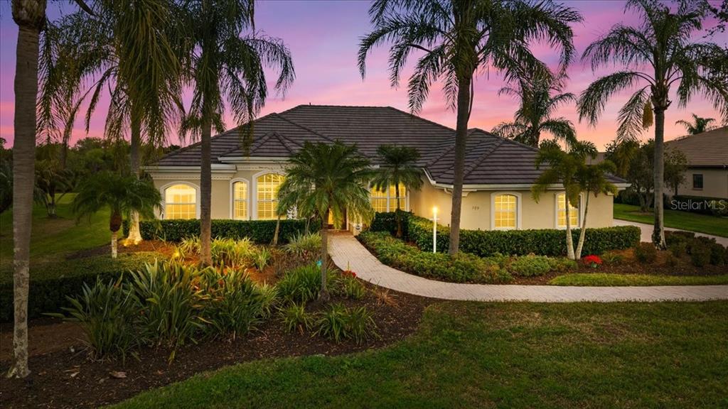 709 Country Meadows Way Bradenton, FL 34212 - Photo 2 of 97 a view of a house with a swimming pool